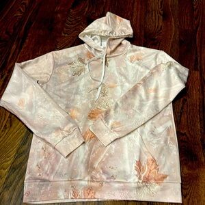 Very thin Athletic Like Hoodie with light camo print.  Ladies M